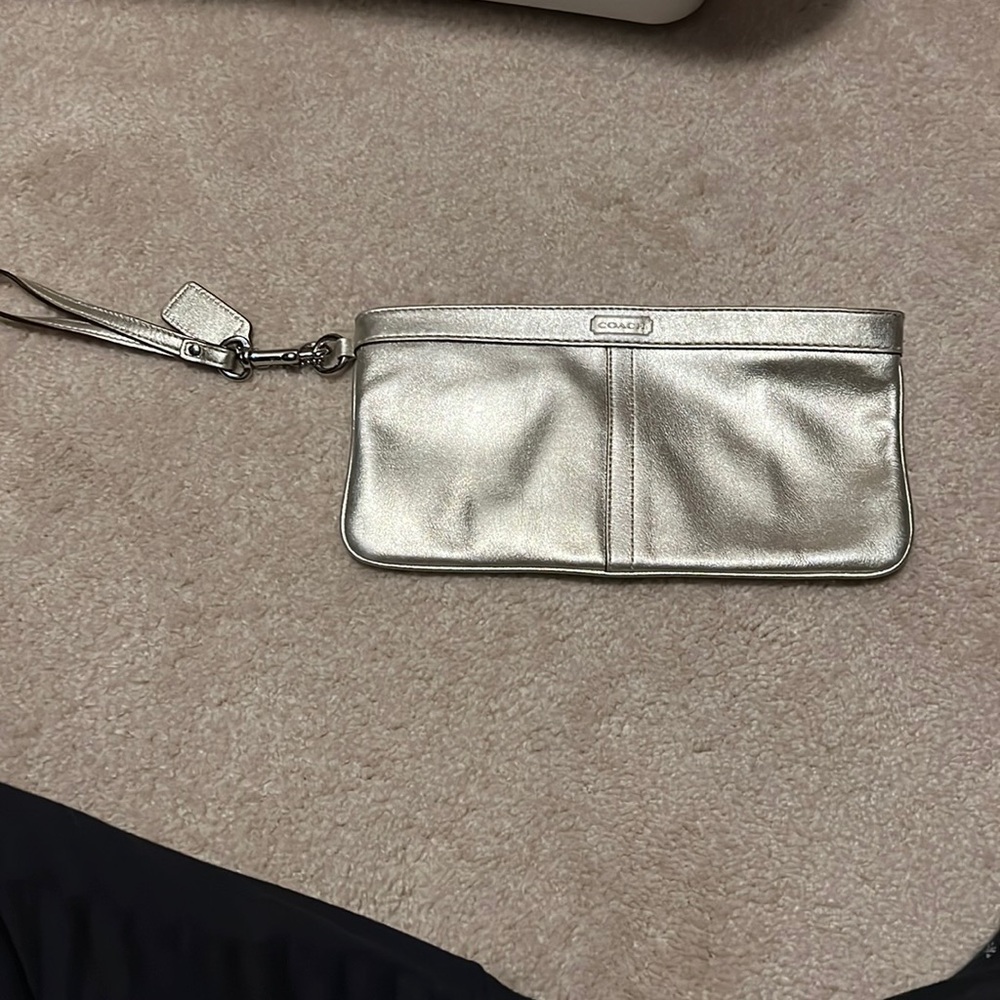 Coach gold wristlet